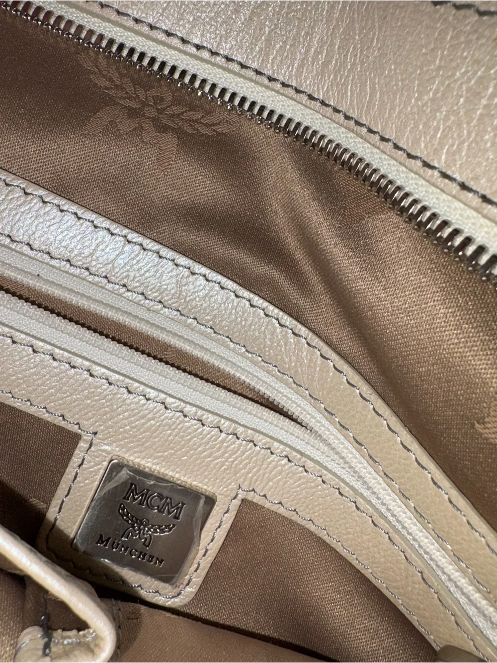 MCM cognac logo